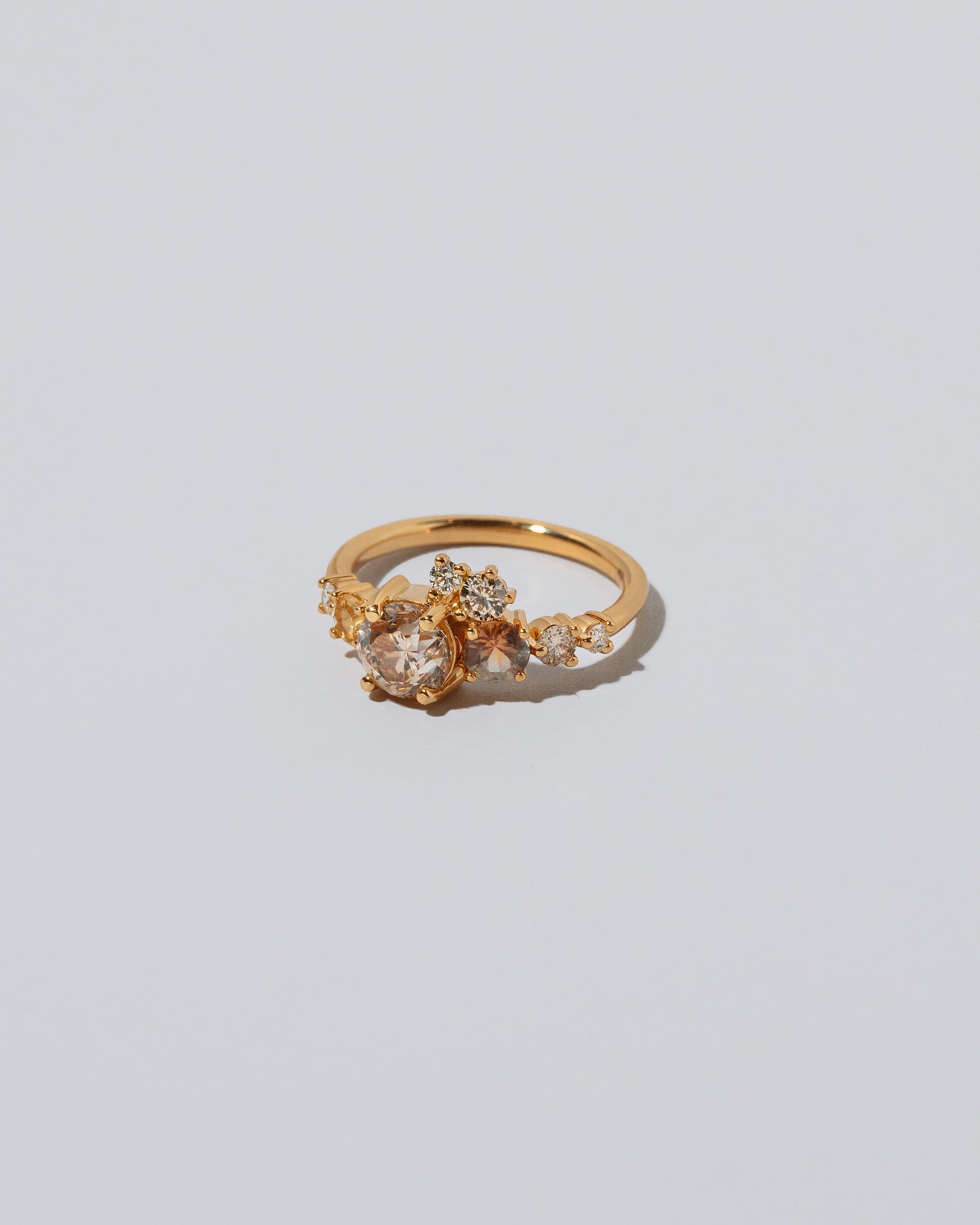 Product photo of Champagne Luna Ring on light color background. 