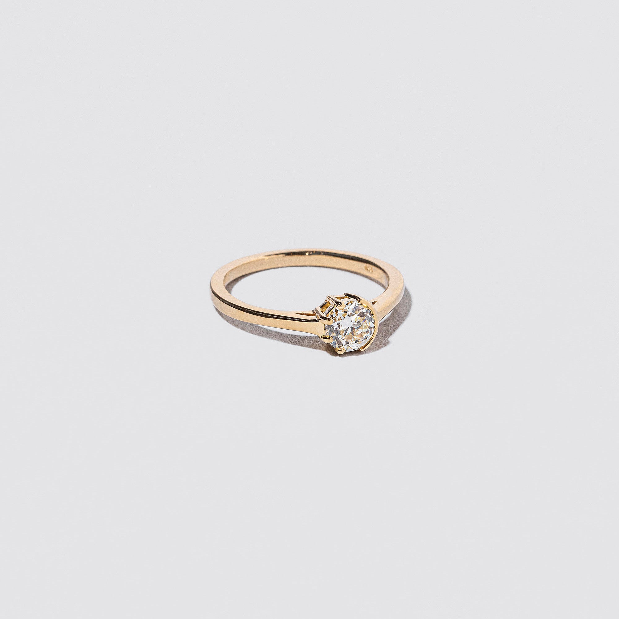 product_details::Sun & Moon Ring - White Diamond on light color background.