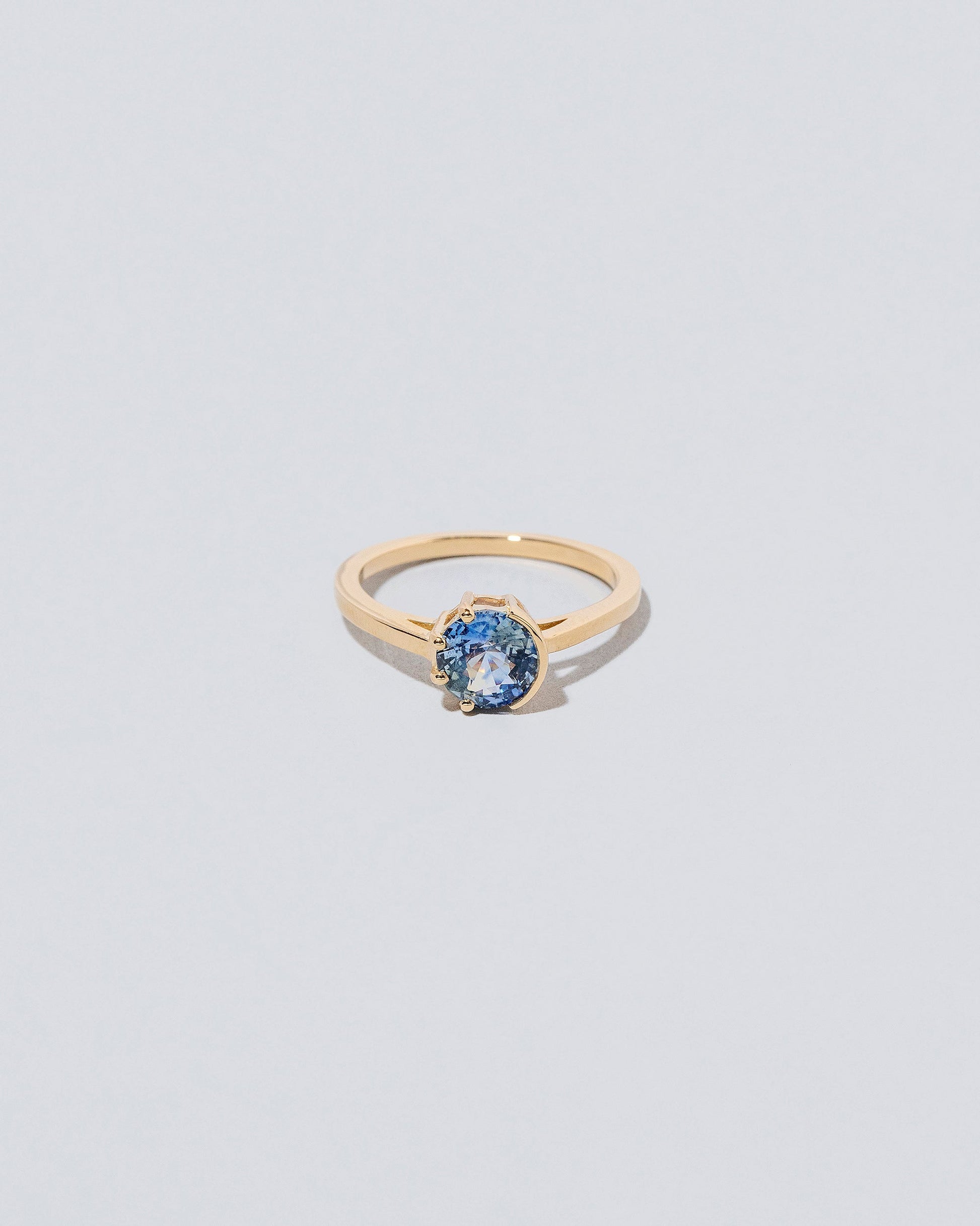 Sun & Moon Ring - Bicolor Sapphire on light color background.