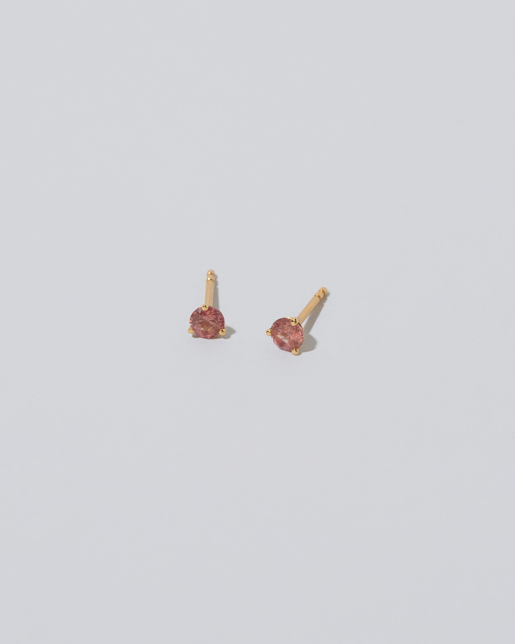Product photo of Martini Studs - Coral Sapphire on light color background