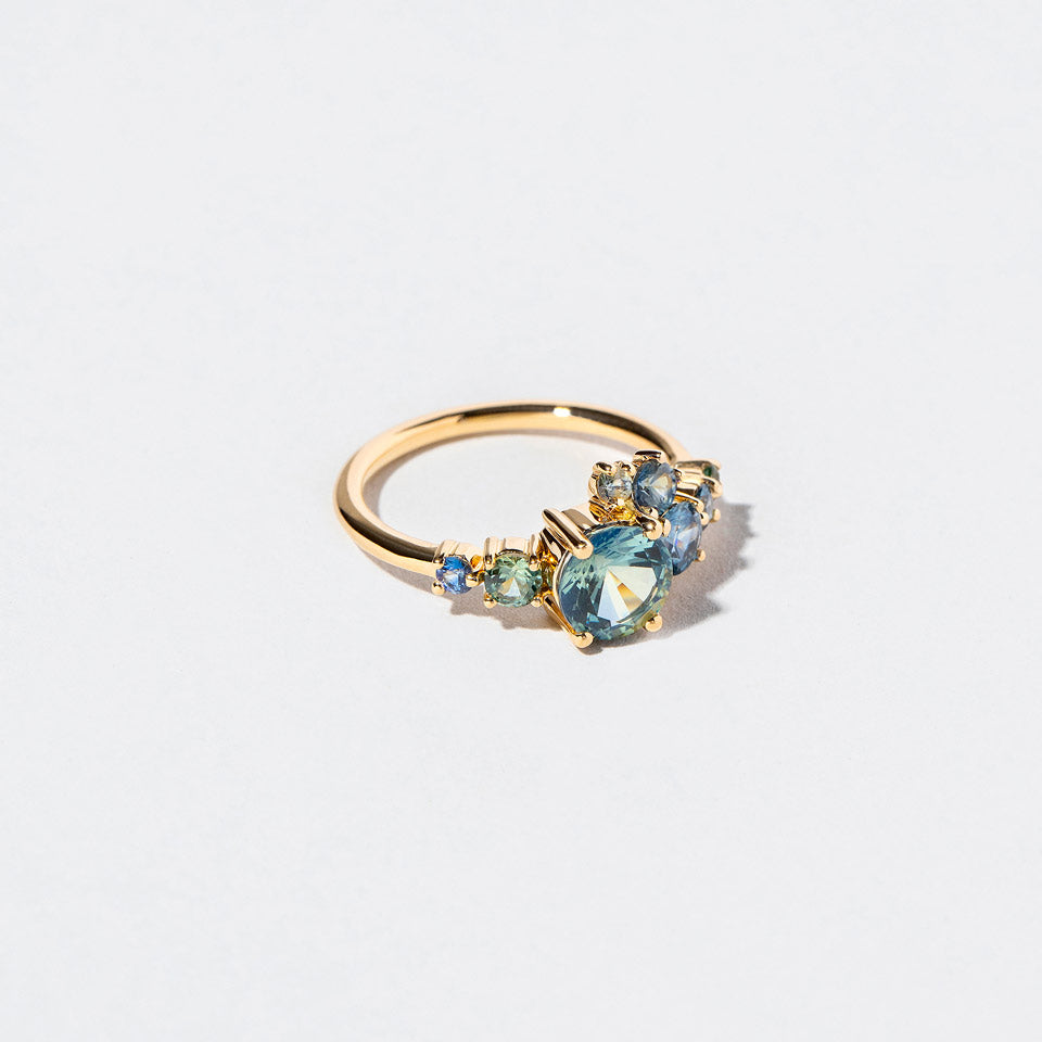 product_details::Luna Ring - Bicolor Sapphire on light color background.