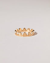 Gold Pearls of Wisdom Band on light color background.