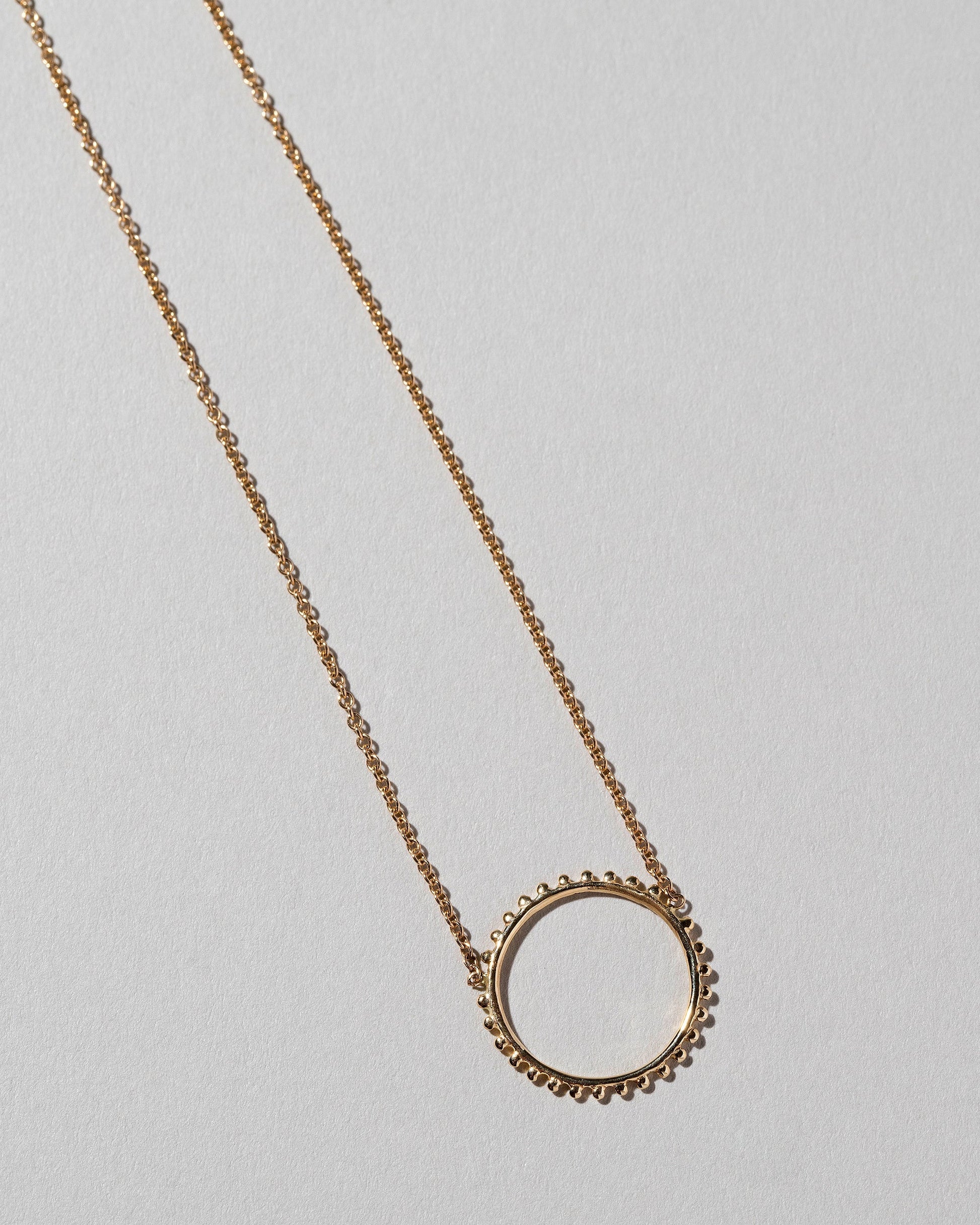 Sunbow Necklace on light colored background.