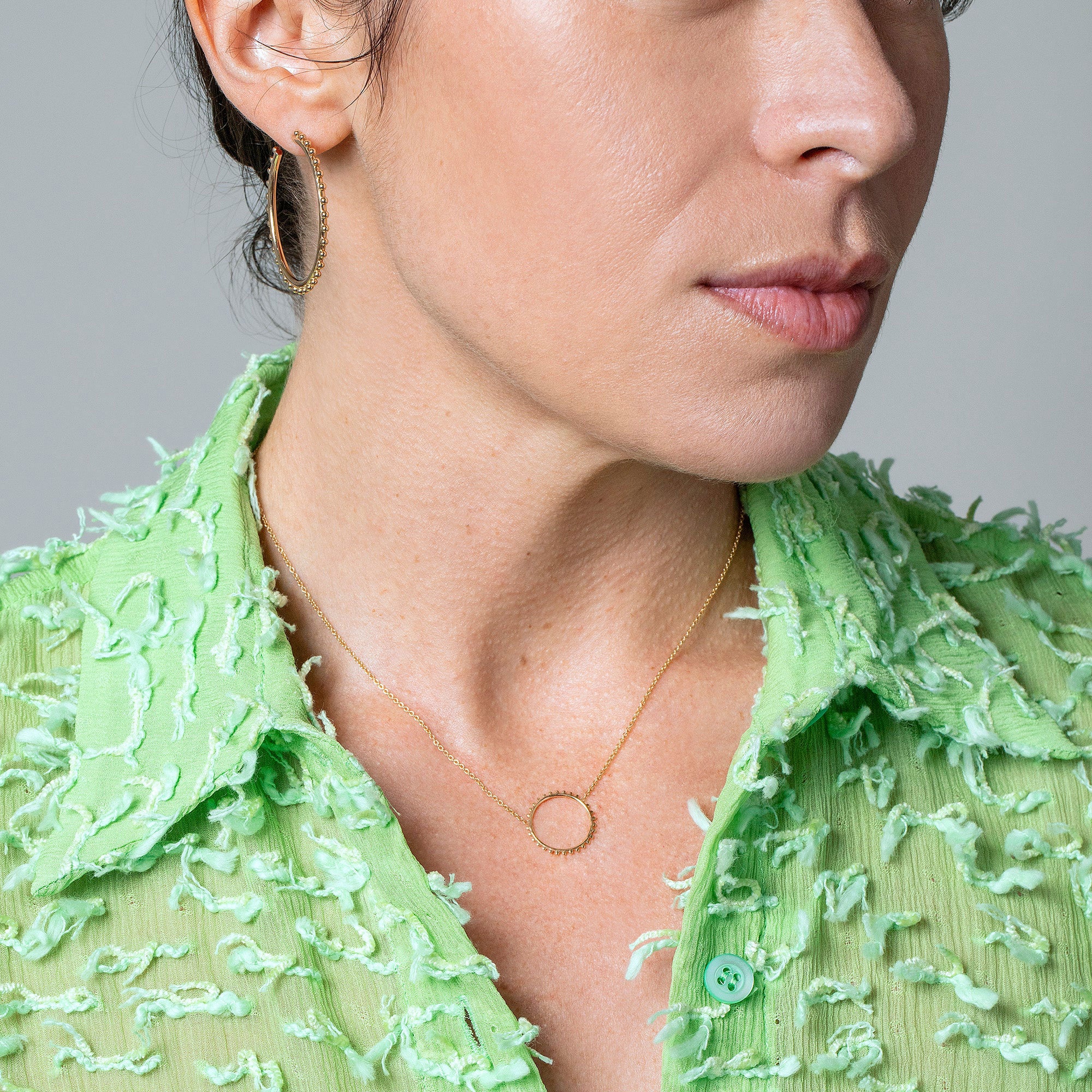 product_details::Sunbow Necklace on model.