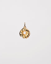  French Cruller Charm on light color background.