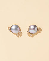  Mabe Pearl Cluster Earrings on light color background.