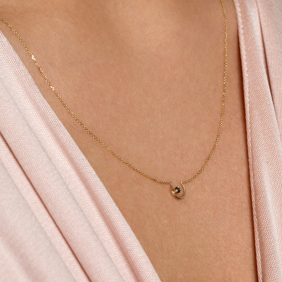 product_details::Moon Ray Necklace on model.