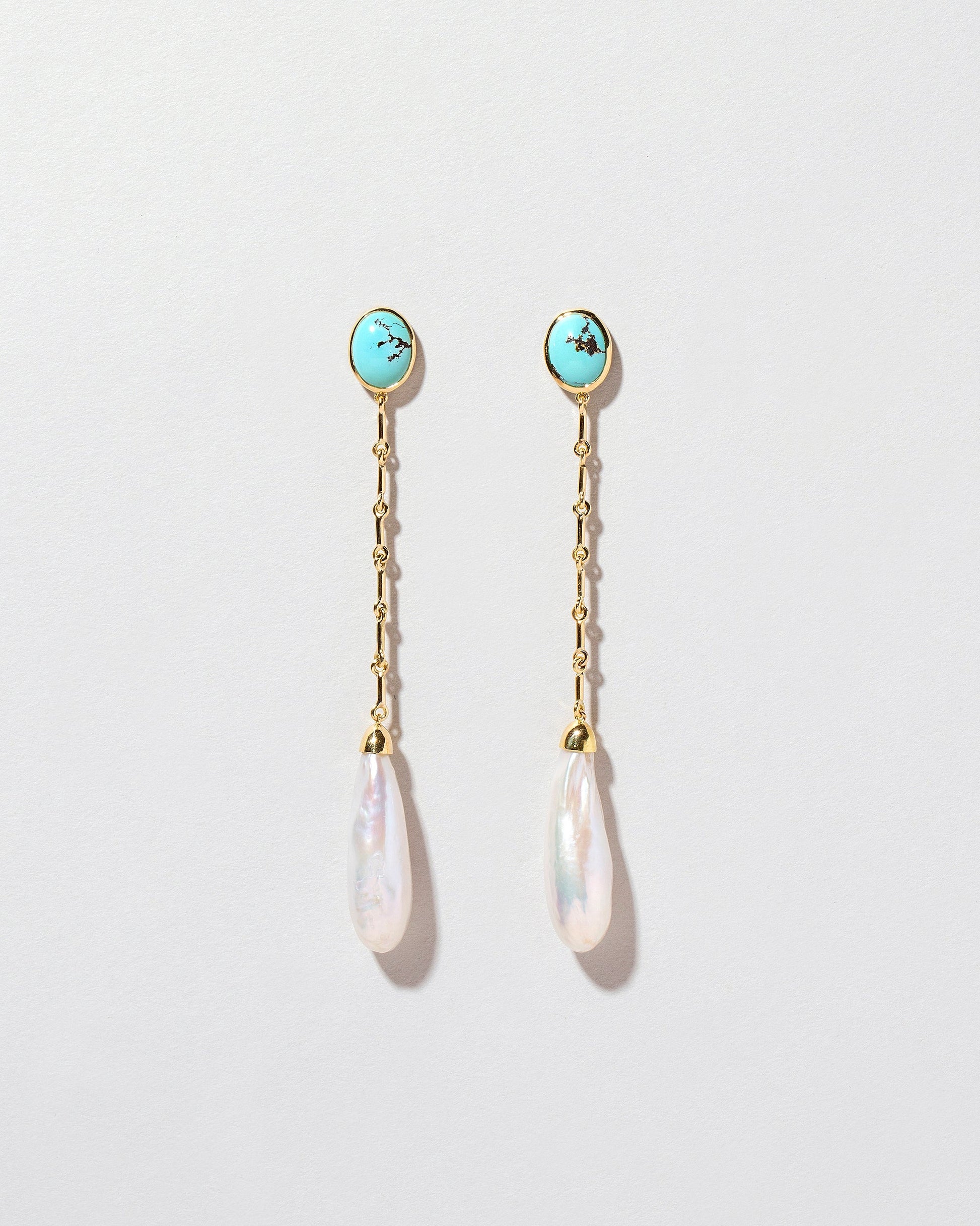  Pearl & Turquoise Shoulder Dusters on light color background.
