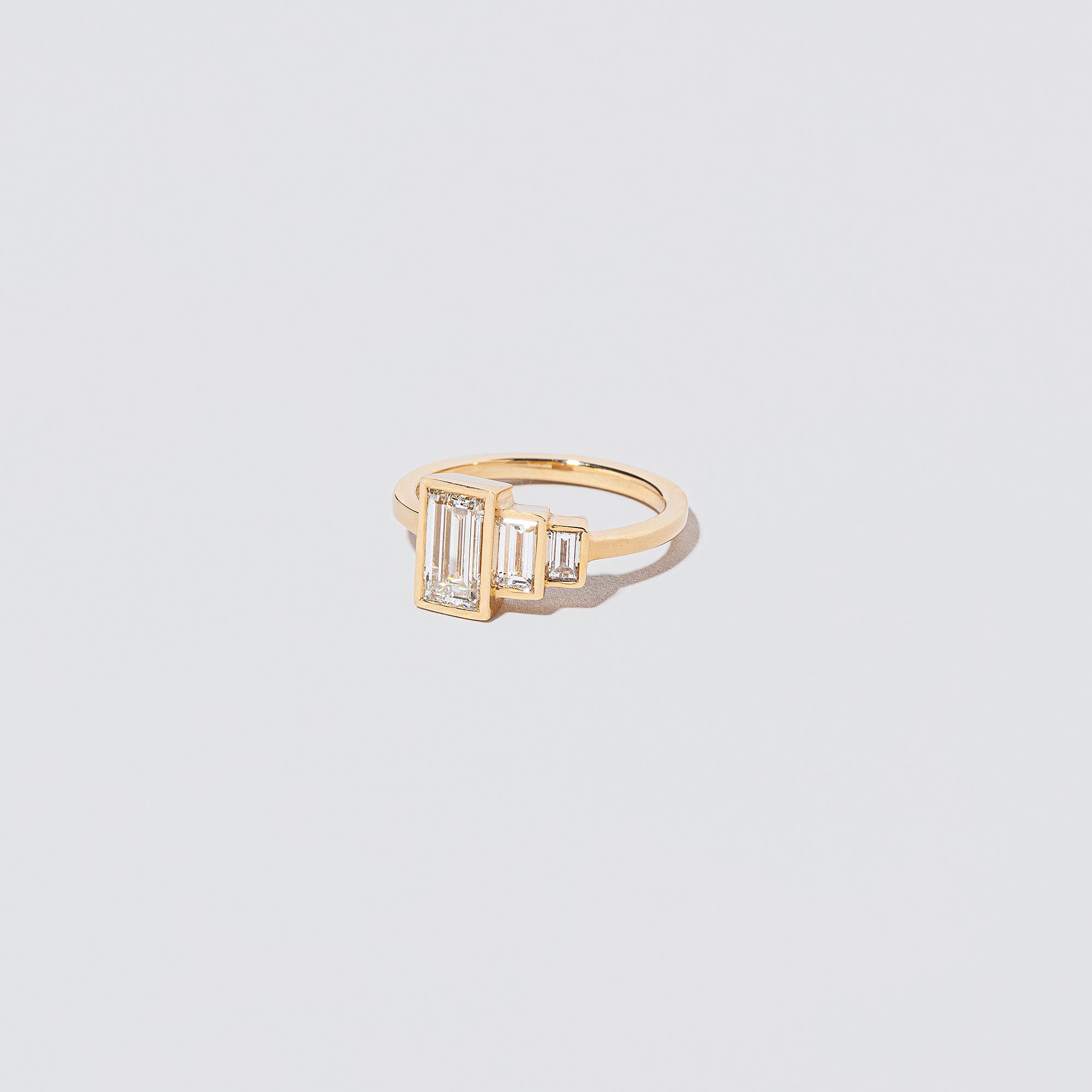 product_details:: Union Ring on light color background.