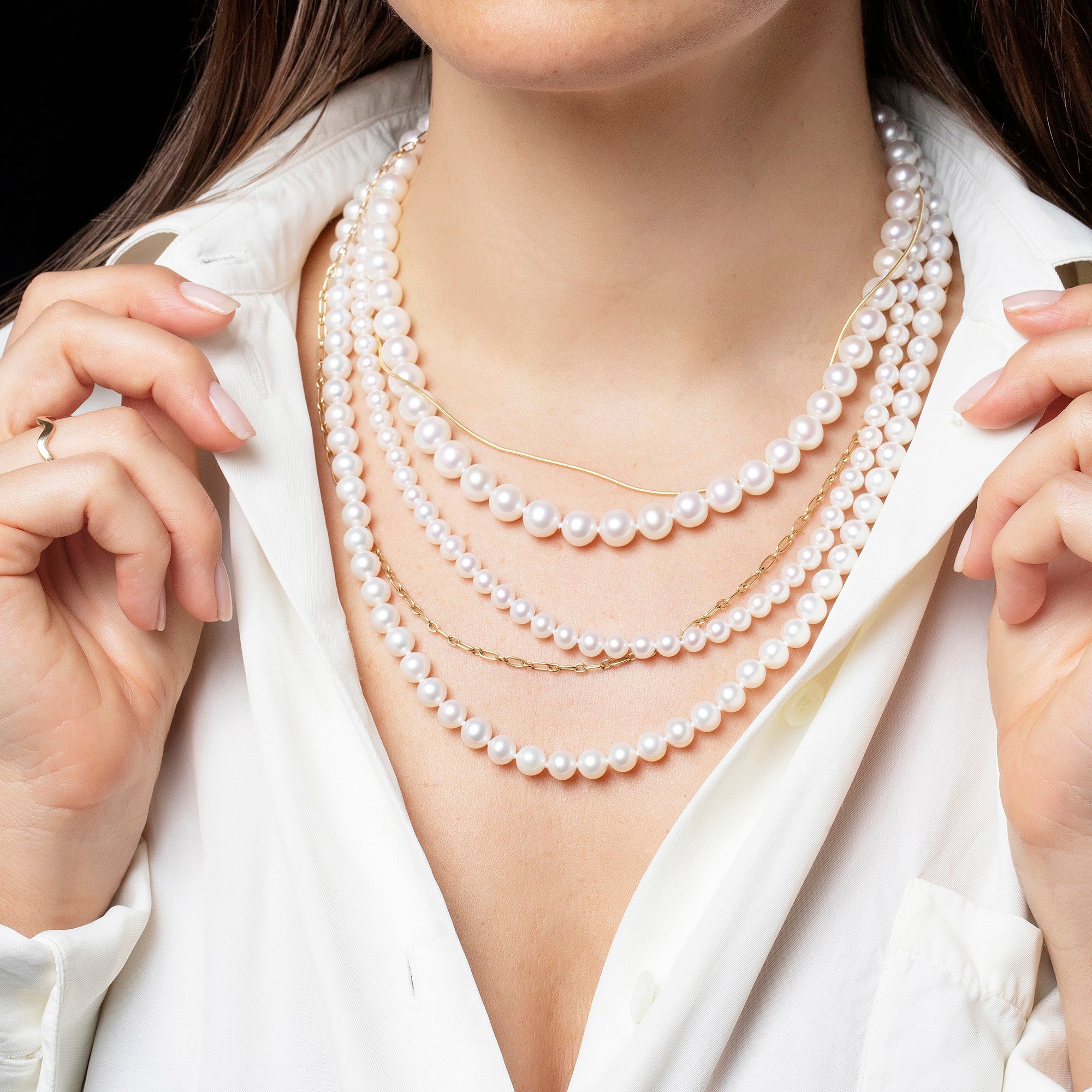 product_details::Layered Pearl Necklace on model.