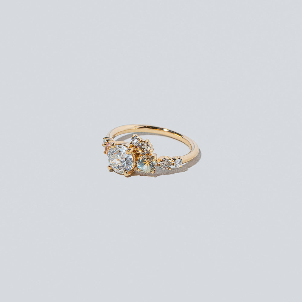 product_details::Peach Luna Ring on light colored background.