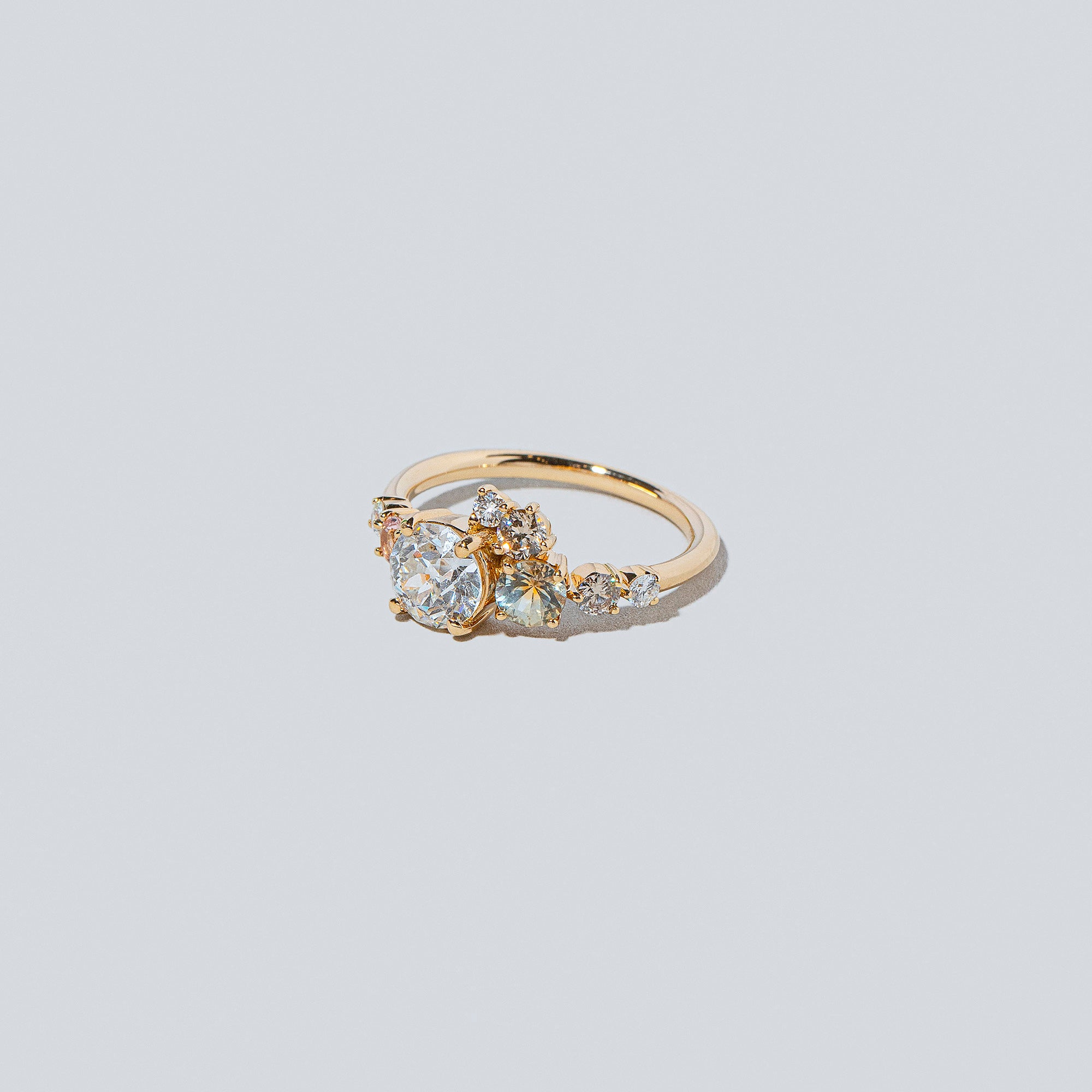 product_details::Peach Luna Ring on light colored background.