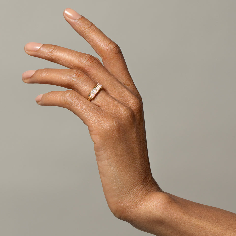 product_details::Five Triangle Ring - Pink Opal on model.