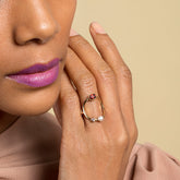 product_details::Trilogy Ring - Garnet on model.