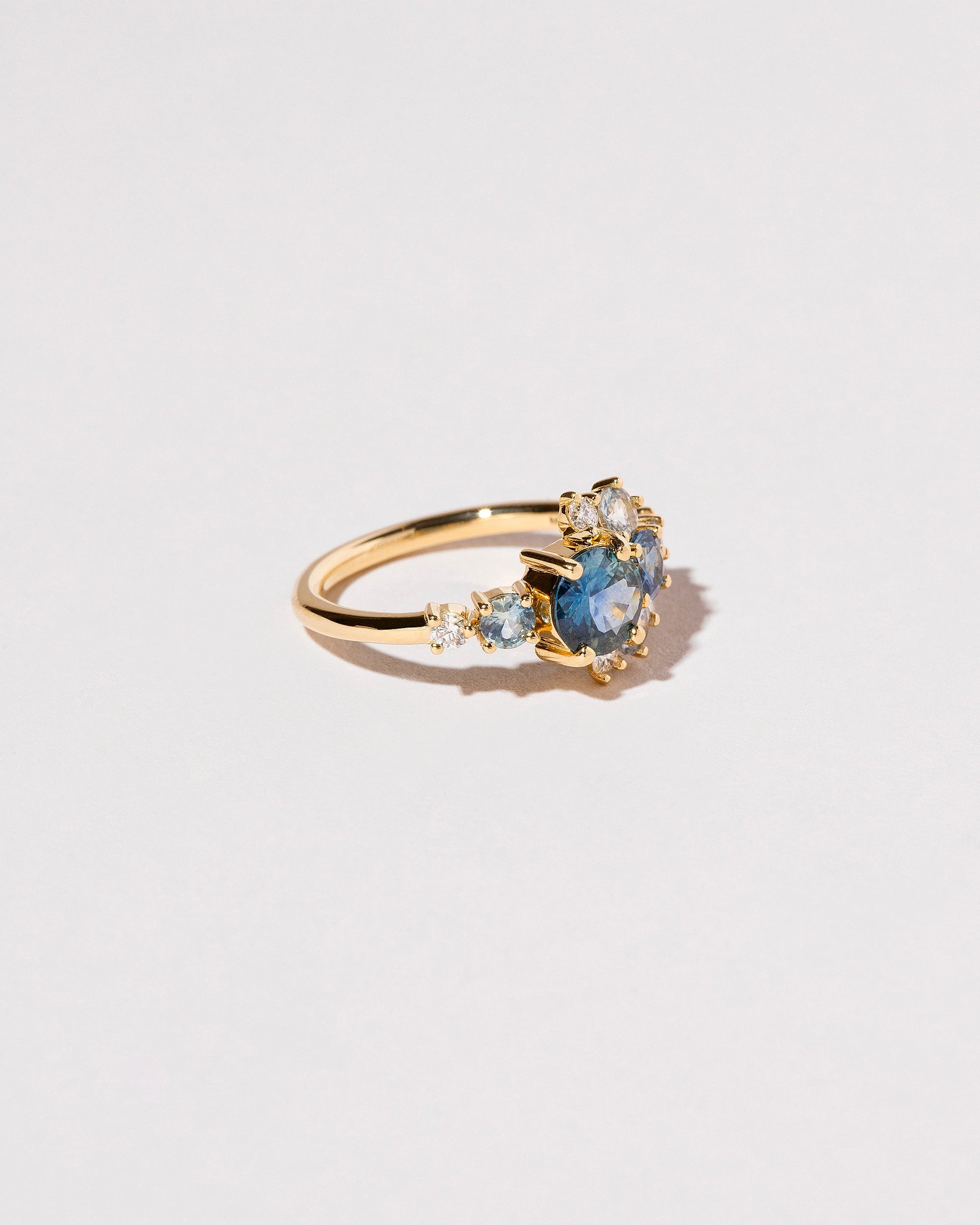  Montana Sapphire Crescent Ring on light color background.