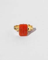 Closeup details of the Antique Carnelian Flip Ring on light color background.