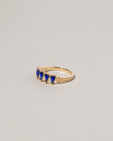  Five Triangle Ring - Lapis on light color background.