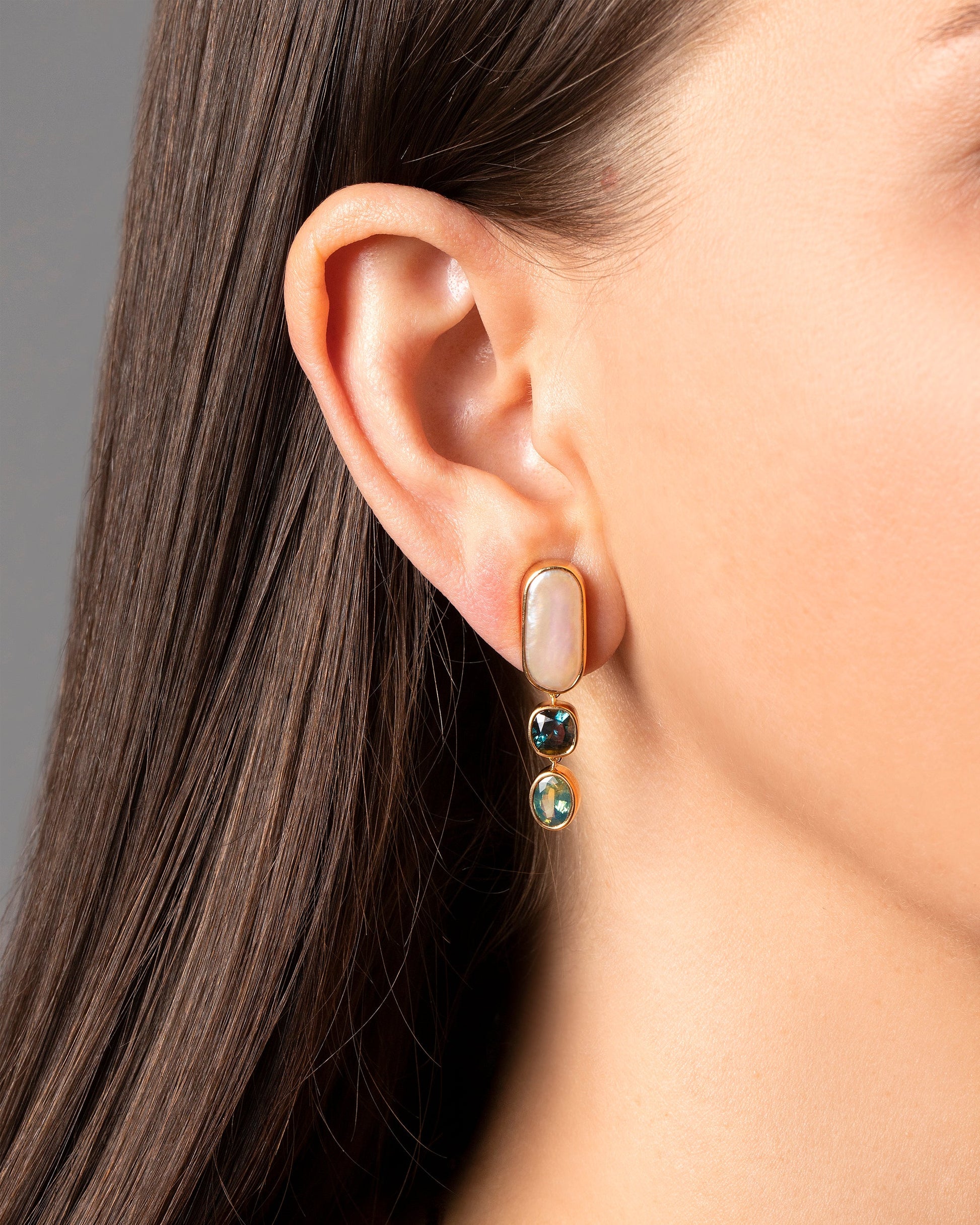Luster Earrings on model.