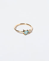  Teardrop Ring - Blue Zircon on light color background.