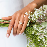 product_details::White Diamond Crescent Ring on model.