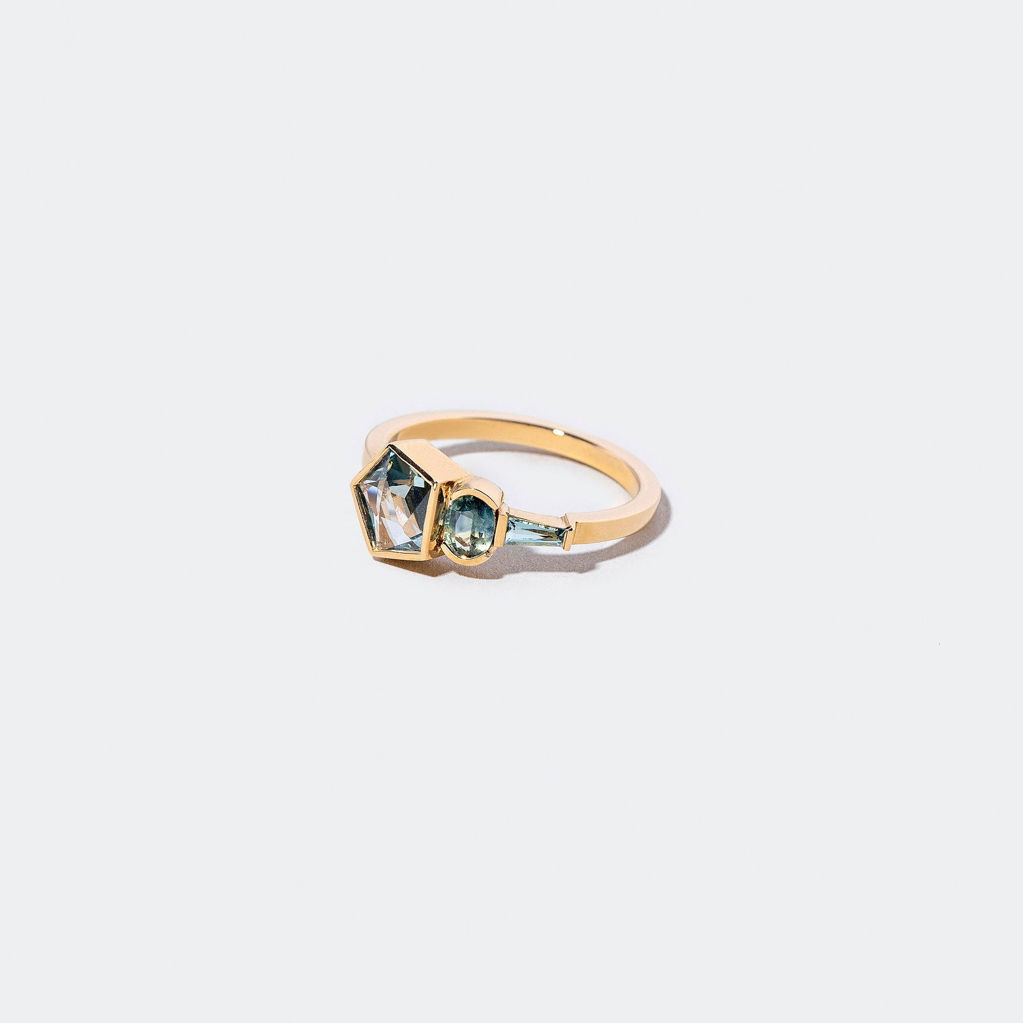 product_details:: Syncretism Ring on light color background.