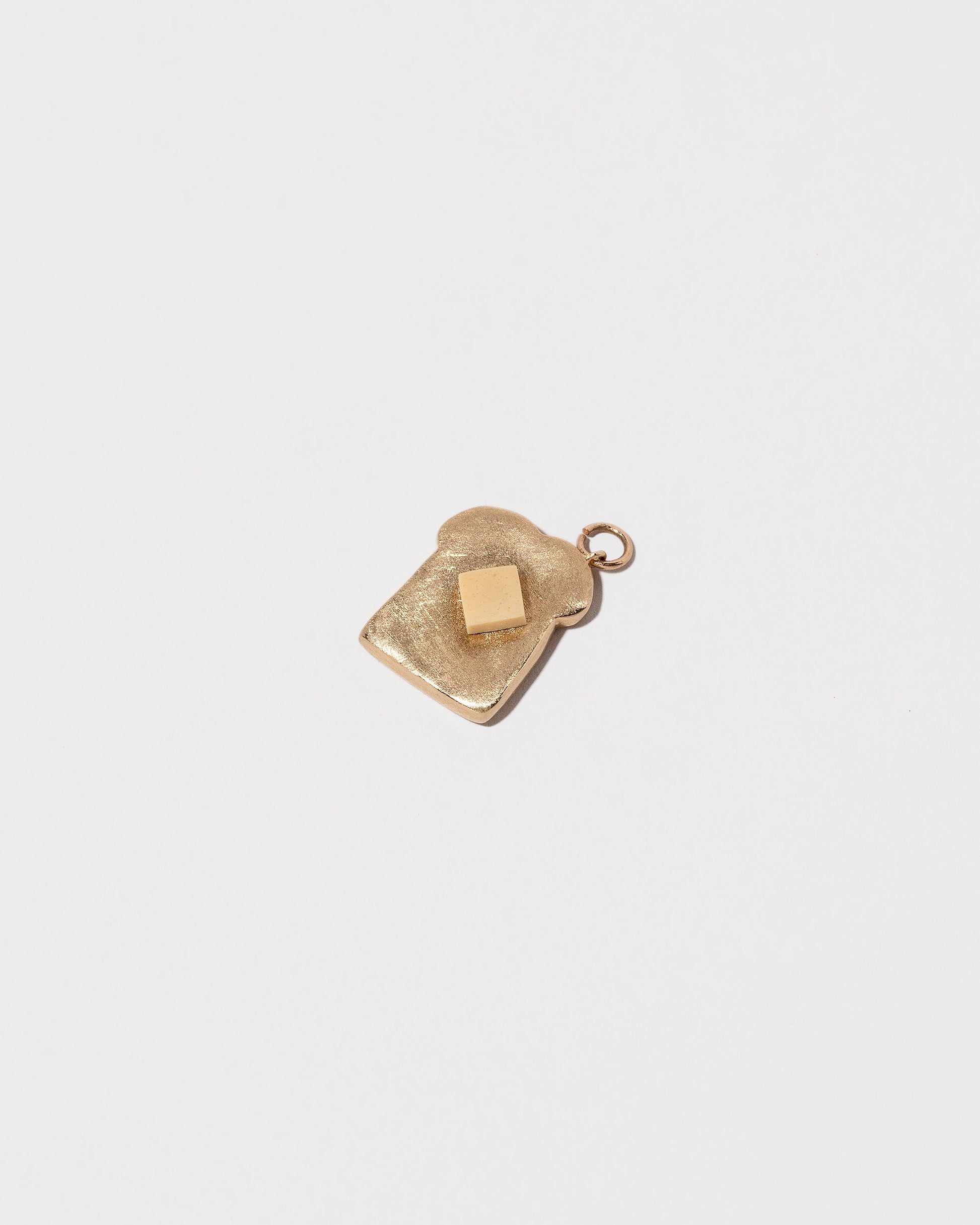  Toast Charm - with Butter on light color background.