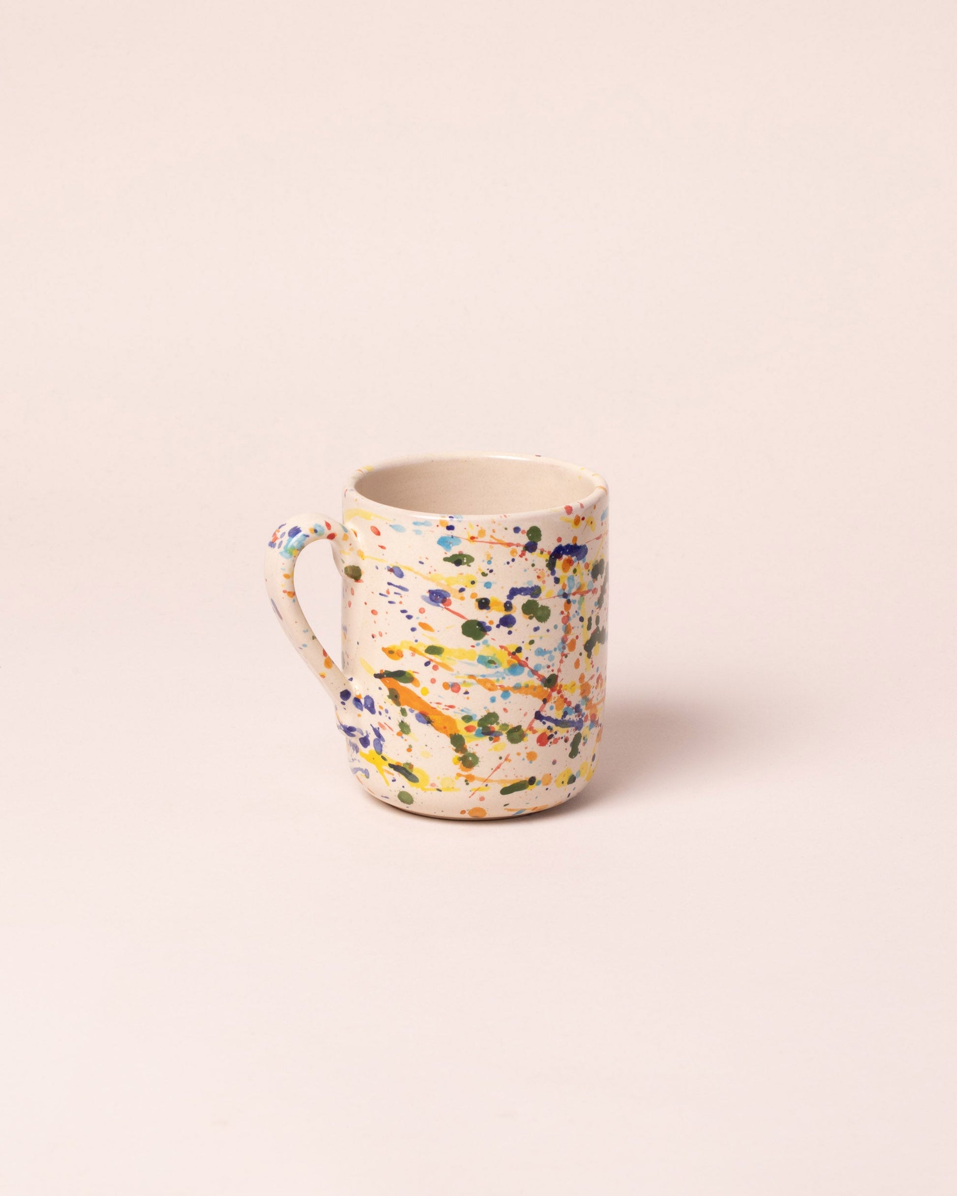 La Ceramica Vincenzo Del Monaco Colored Drops Coffee Mug on light color background.