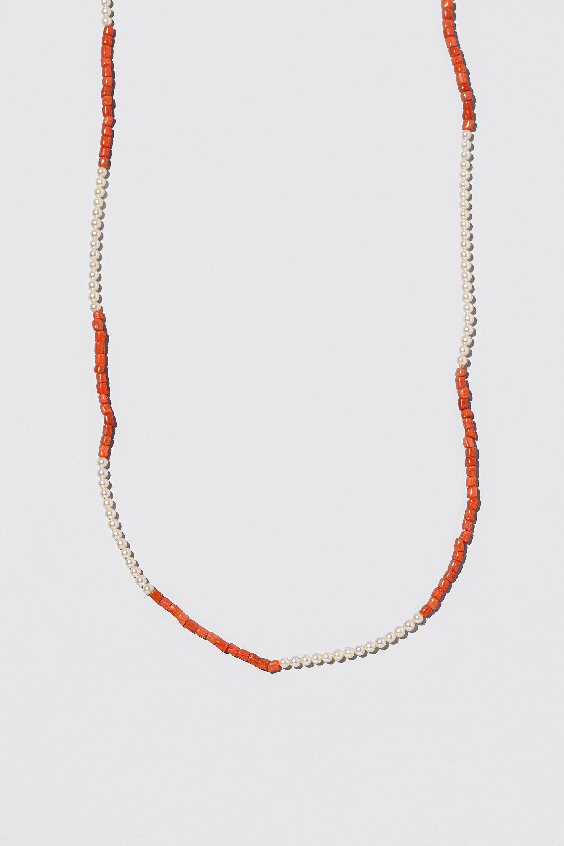 Coral Necklace on light color background.