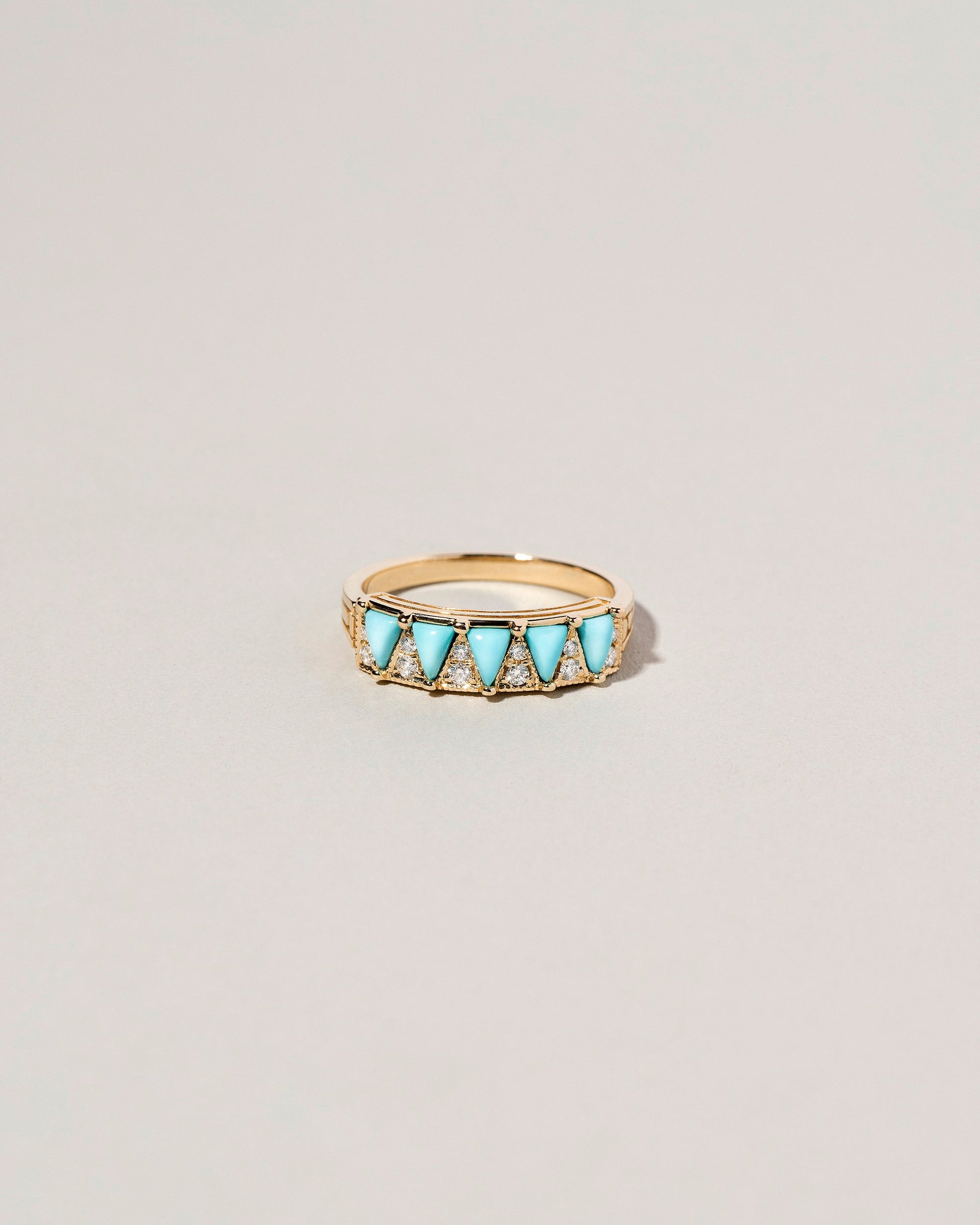  Five Triangle Ring - Turquoise on light color background.