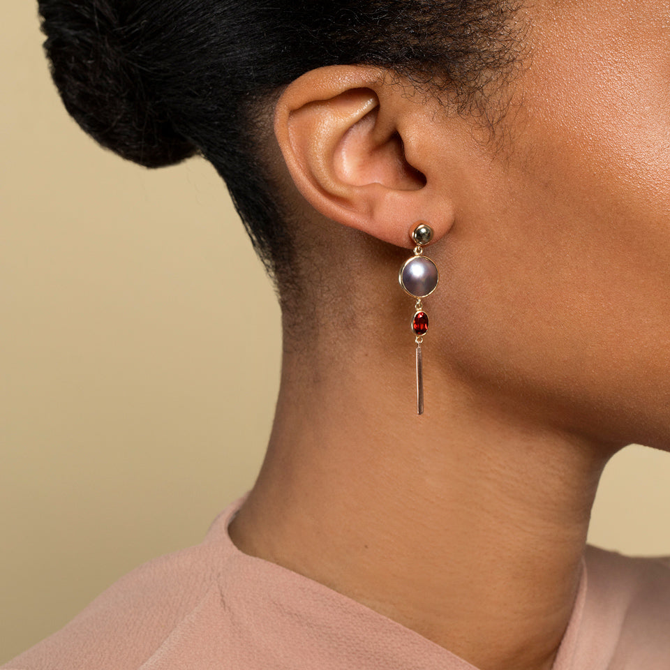 product_details::Act 2. Earrings 3 on model.