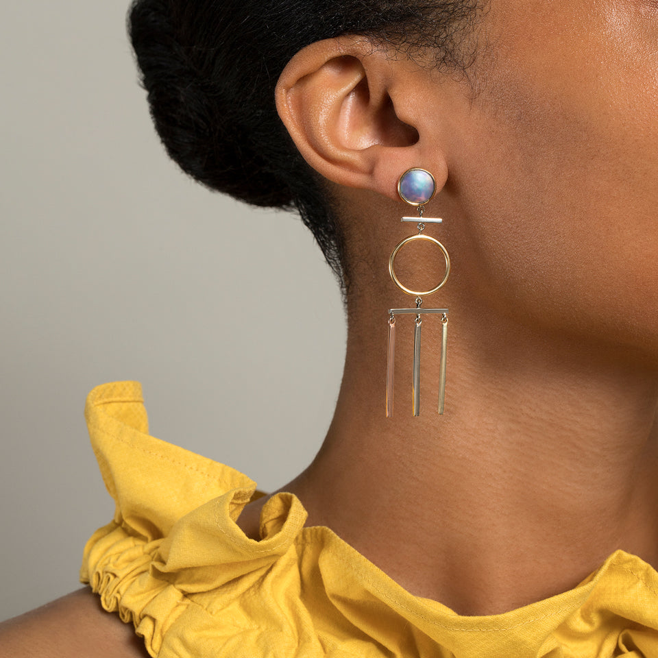 product_details::Figure 2. Drop Earrings on model.