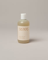  Sisters Body Gentle Body Wash on light color background.