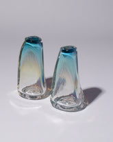 Group of BaleFire Glass Large Miracle Blue Suspension Vases on light color background.