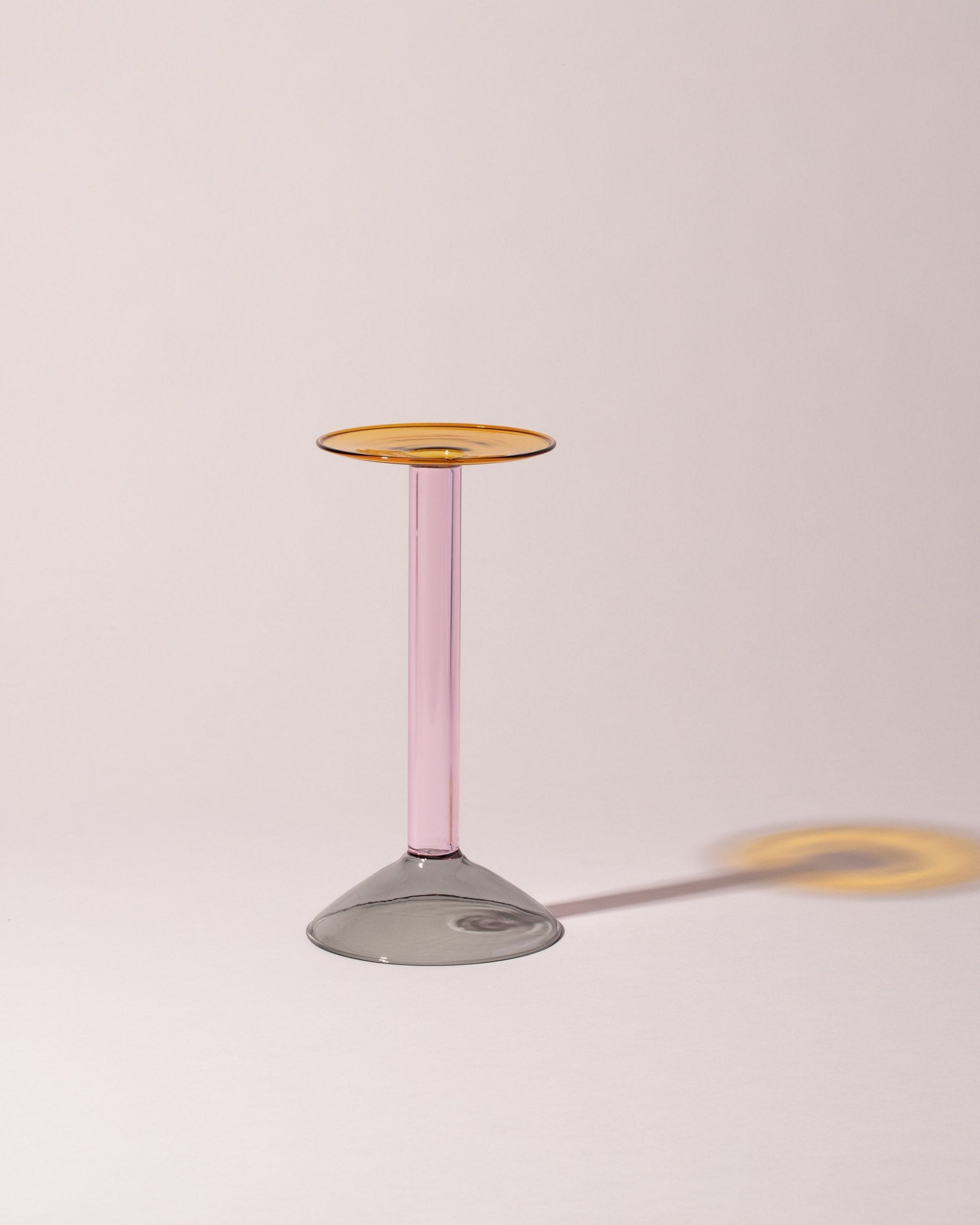 Ichendorf Milano Mediun Grey/Pink/Amber Rainbow Candleholder on light color background.