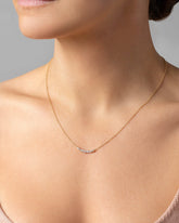 White Diamond Crescent Necklace on model.