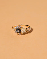  Diamond, Spinel & Sapphire Cluster Ring on light color background.