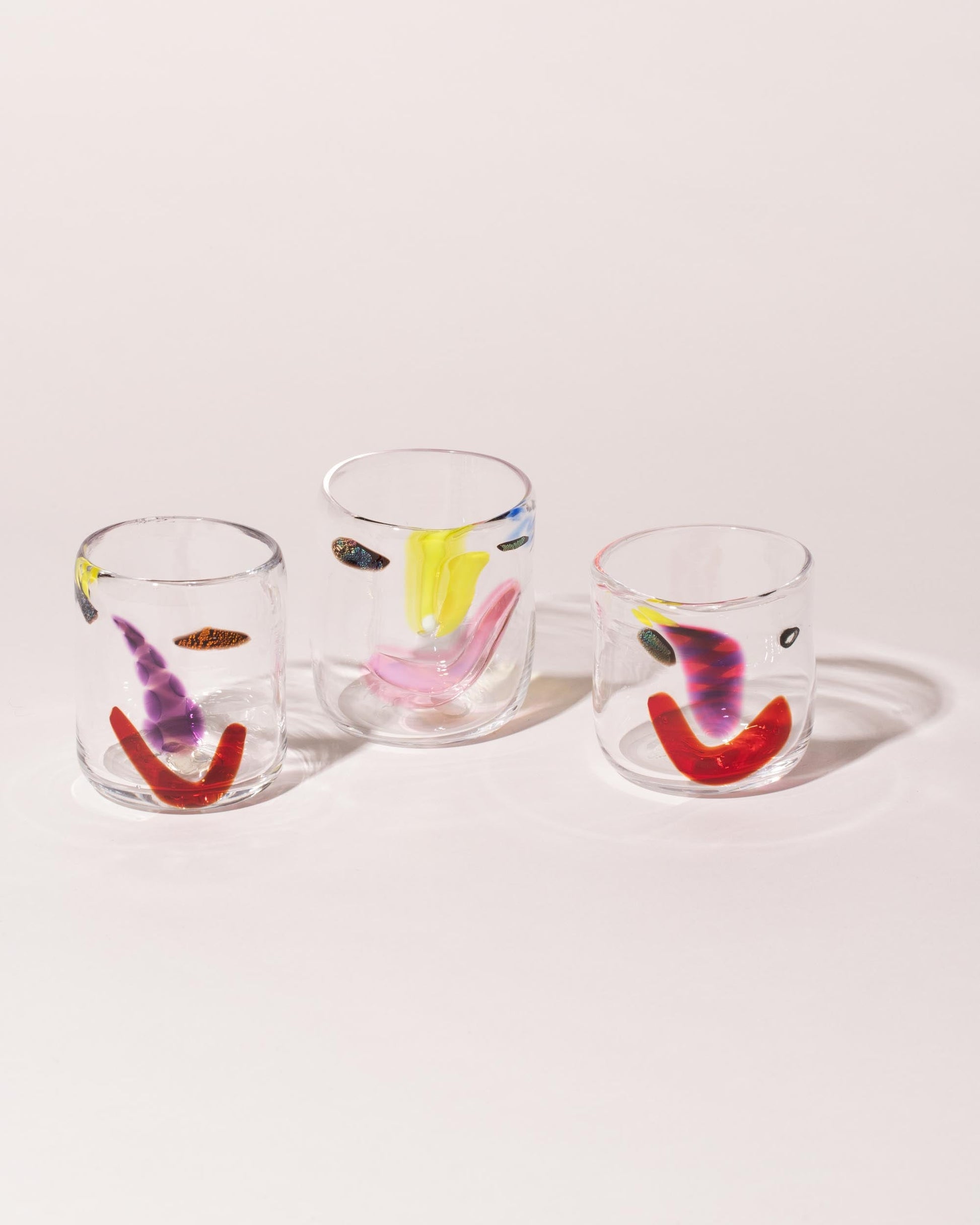 Group of FACEVESSEL Medium Face Glasses on light color background.