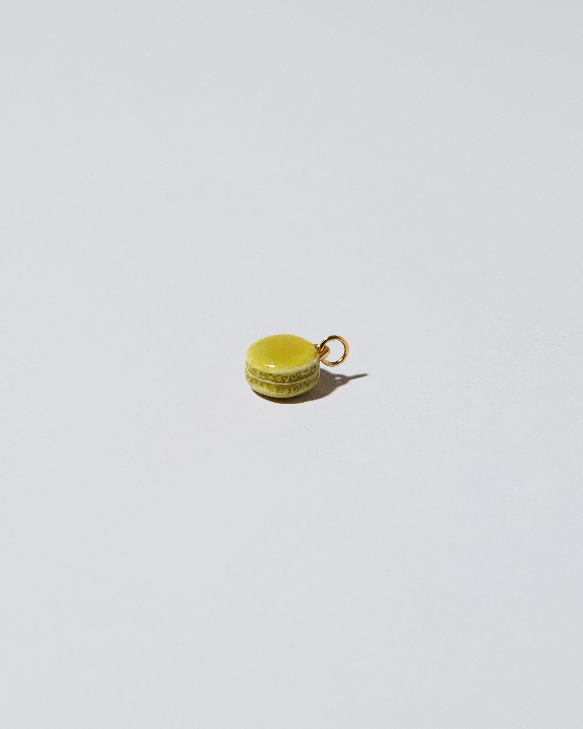 Product photo of Macaron Charm in pistachio on light co