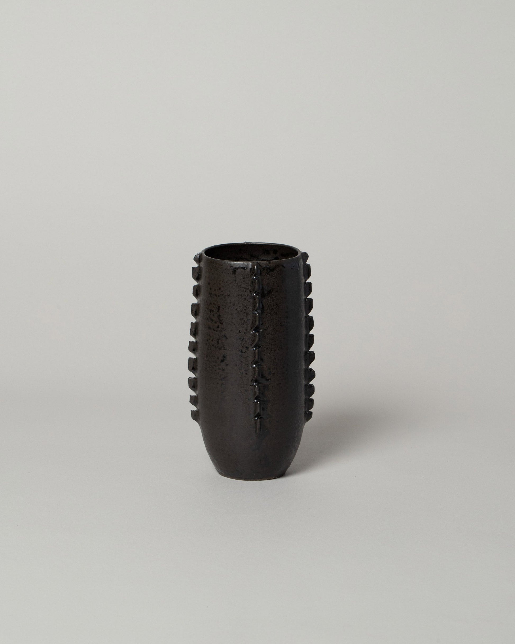  Little Bear Pots Small Black Sawtooth Vase on light color background.