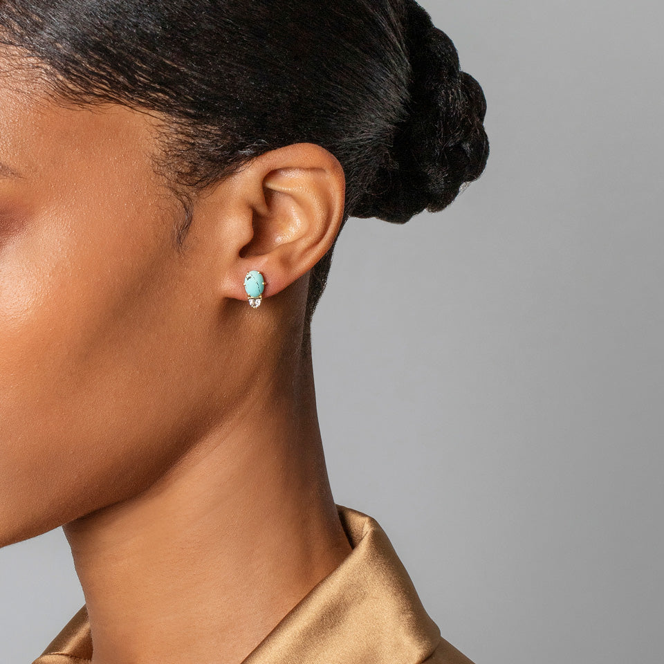 product_details::Divine Protection Earrings on model.