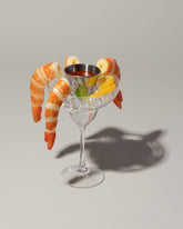Closeup detail of the Spills Shrimp Cocktail on light color background.