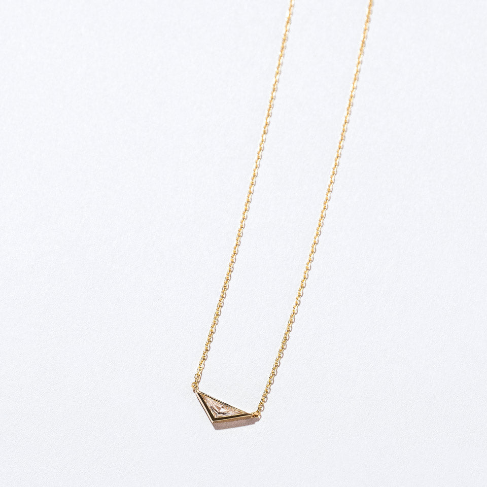 product_details:: Lucky Necklace on light color background.