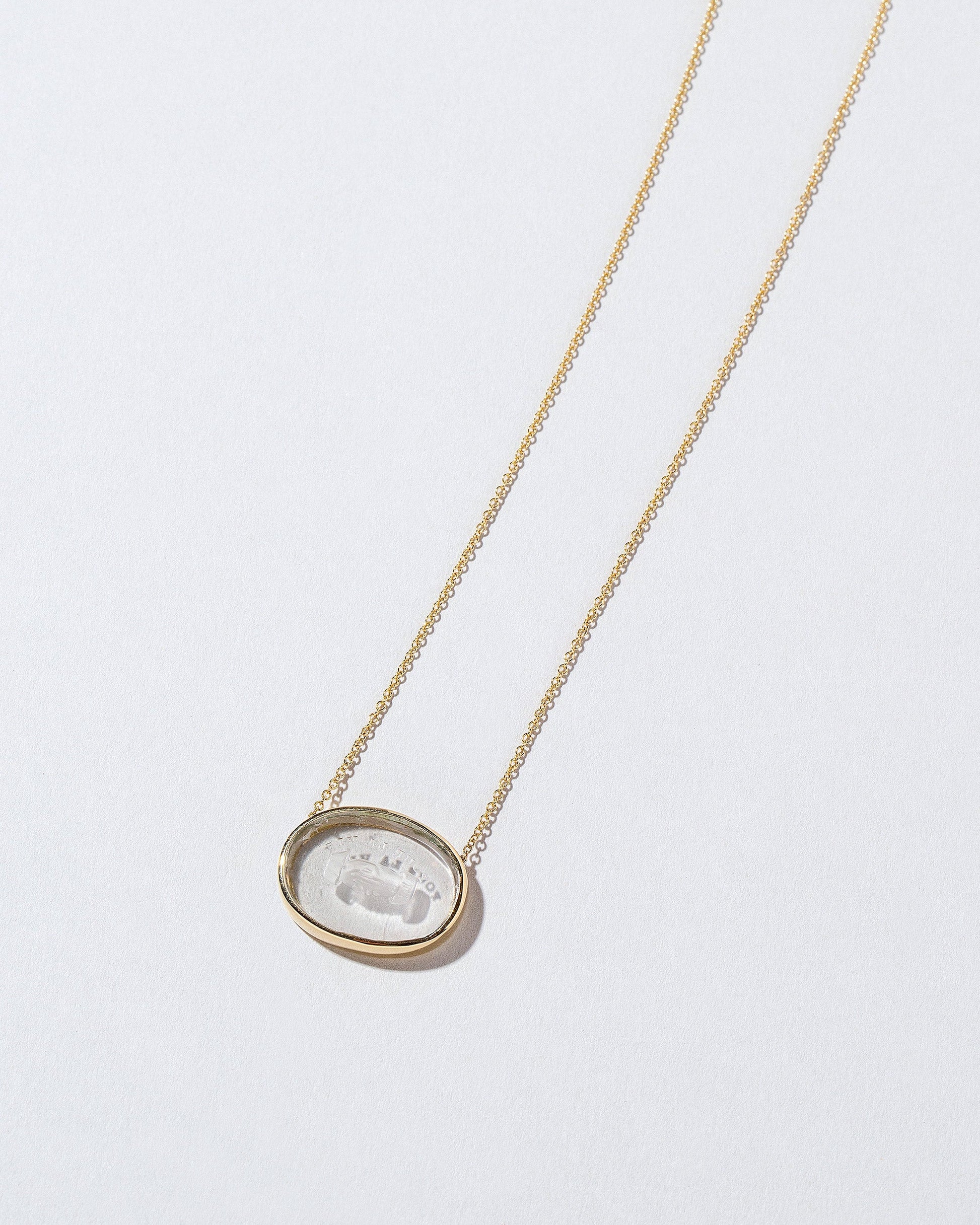 Eternity Intaglio Seal Necklace on light color background.