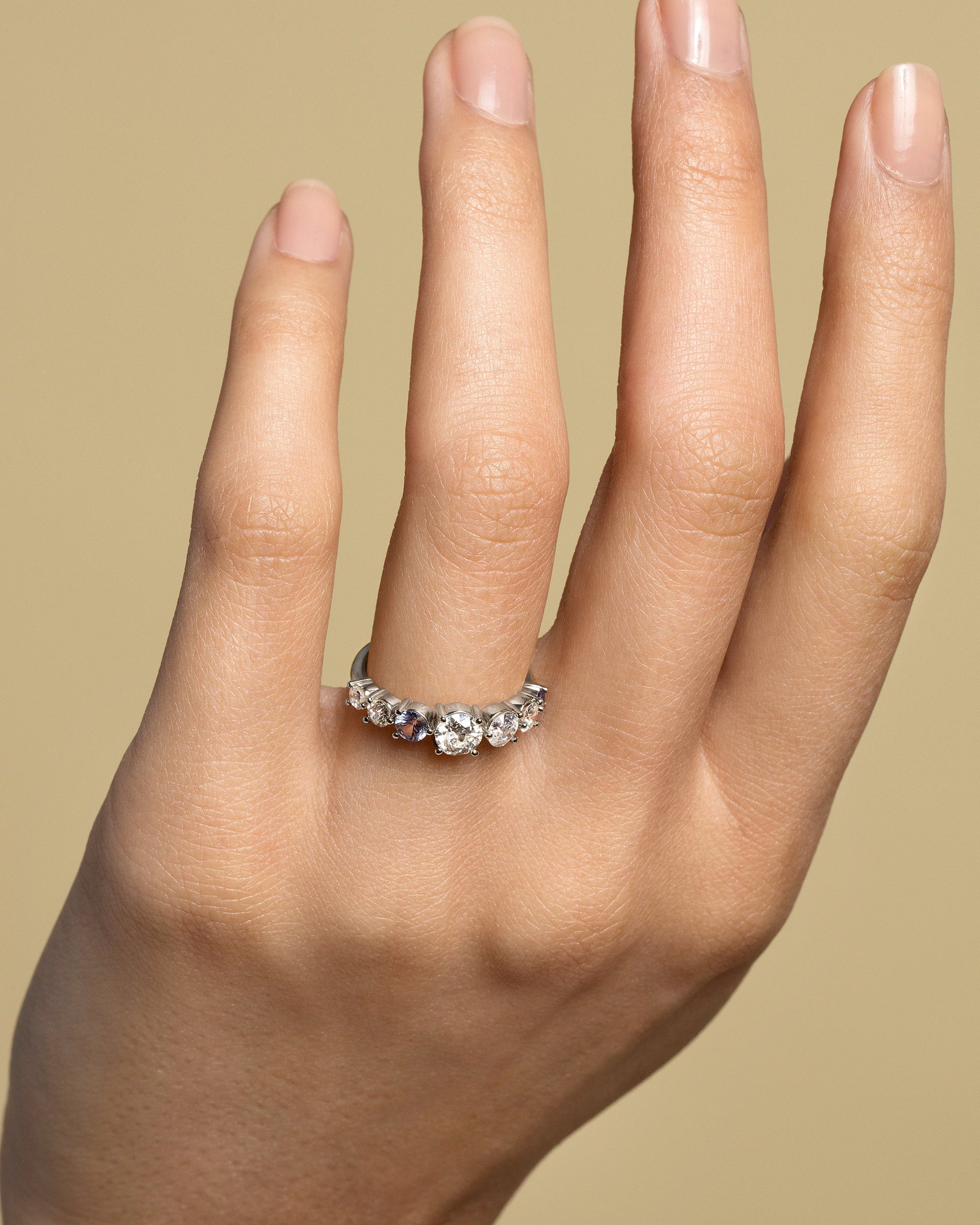 Diamond & Sapphire Line Cluster Ring on model.