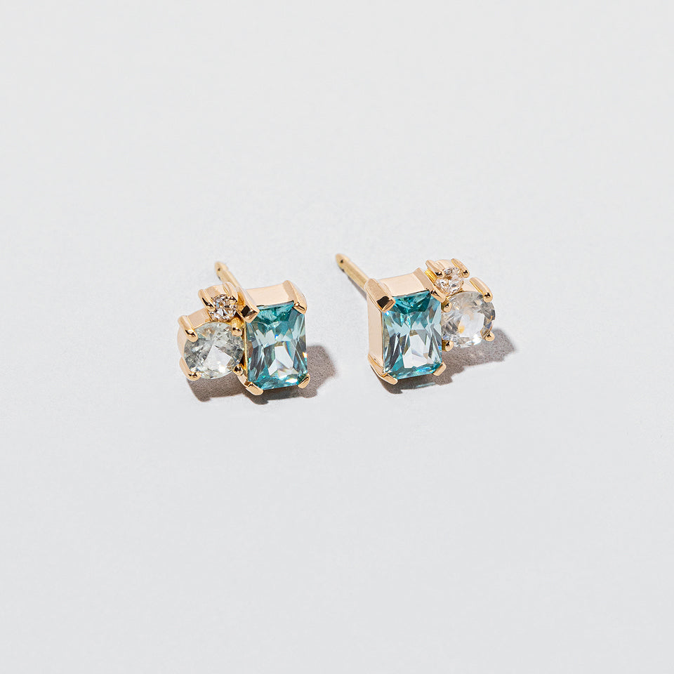 product_details:: Sky Earrings on light color background.
