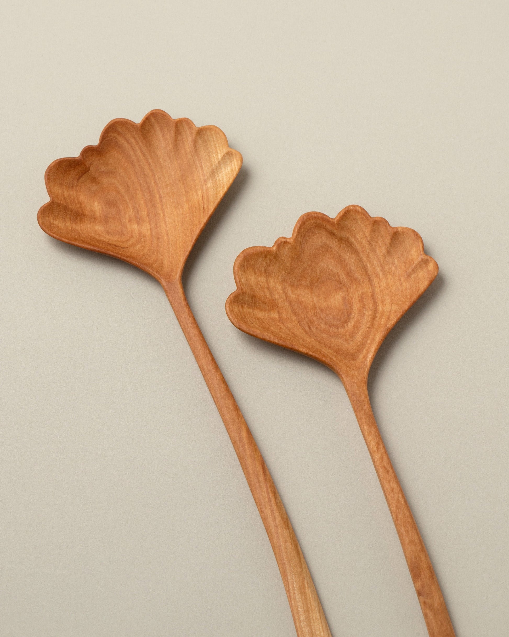 Detail view of Namu Home Goods Birch Ginkgo Leaf Servers on light color background.