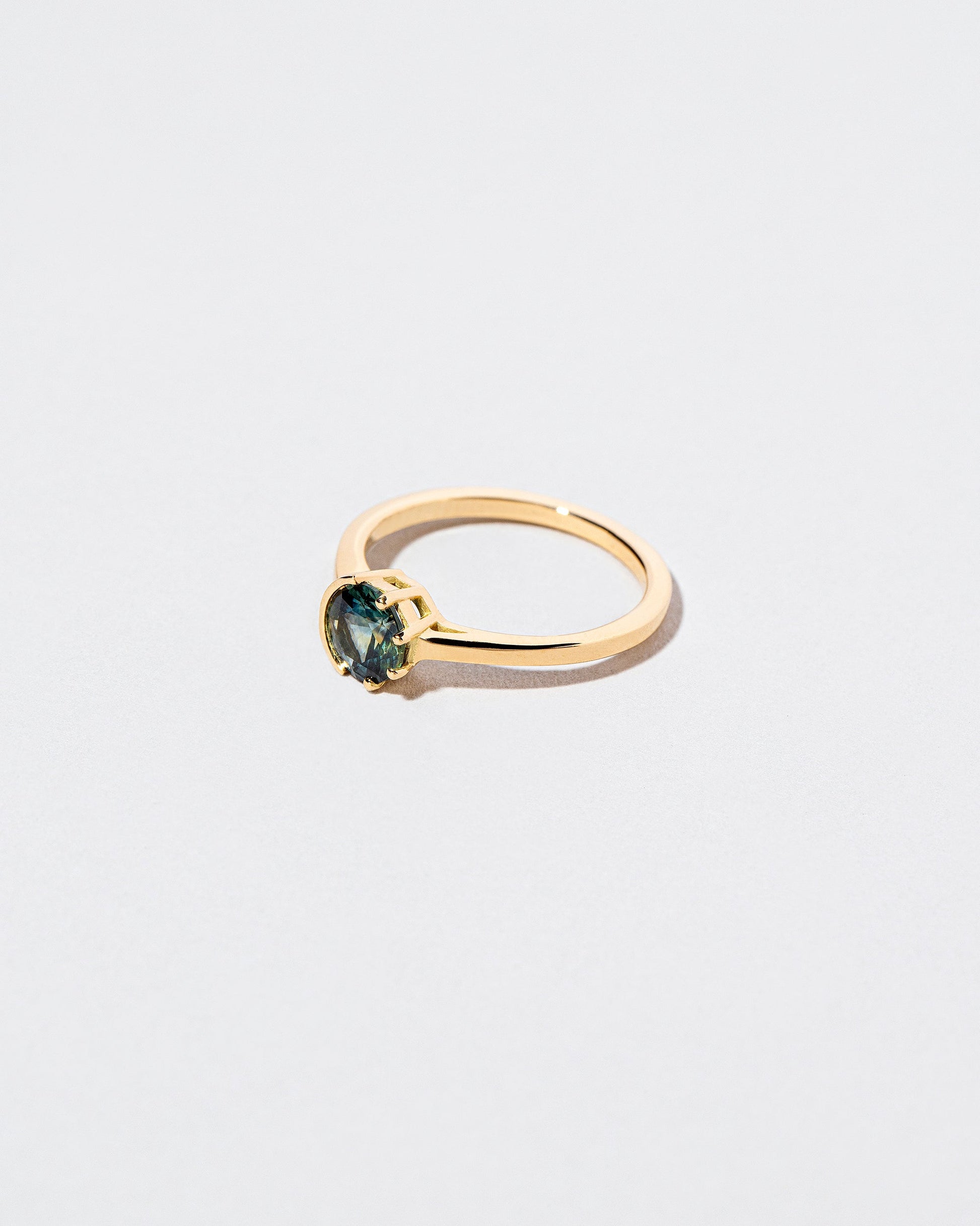  Sun & Moon Ring - Bicolor Teal Sapphire on light color background.