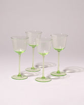 Group of Serax Grace Wine Glasses by Ann Demeulemeester on light color background.