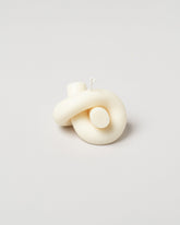 Special Interest Goods Pearl Tie Candle on light color background.