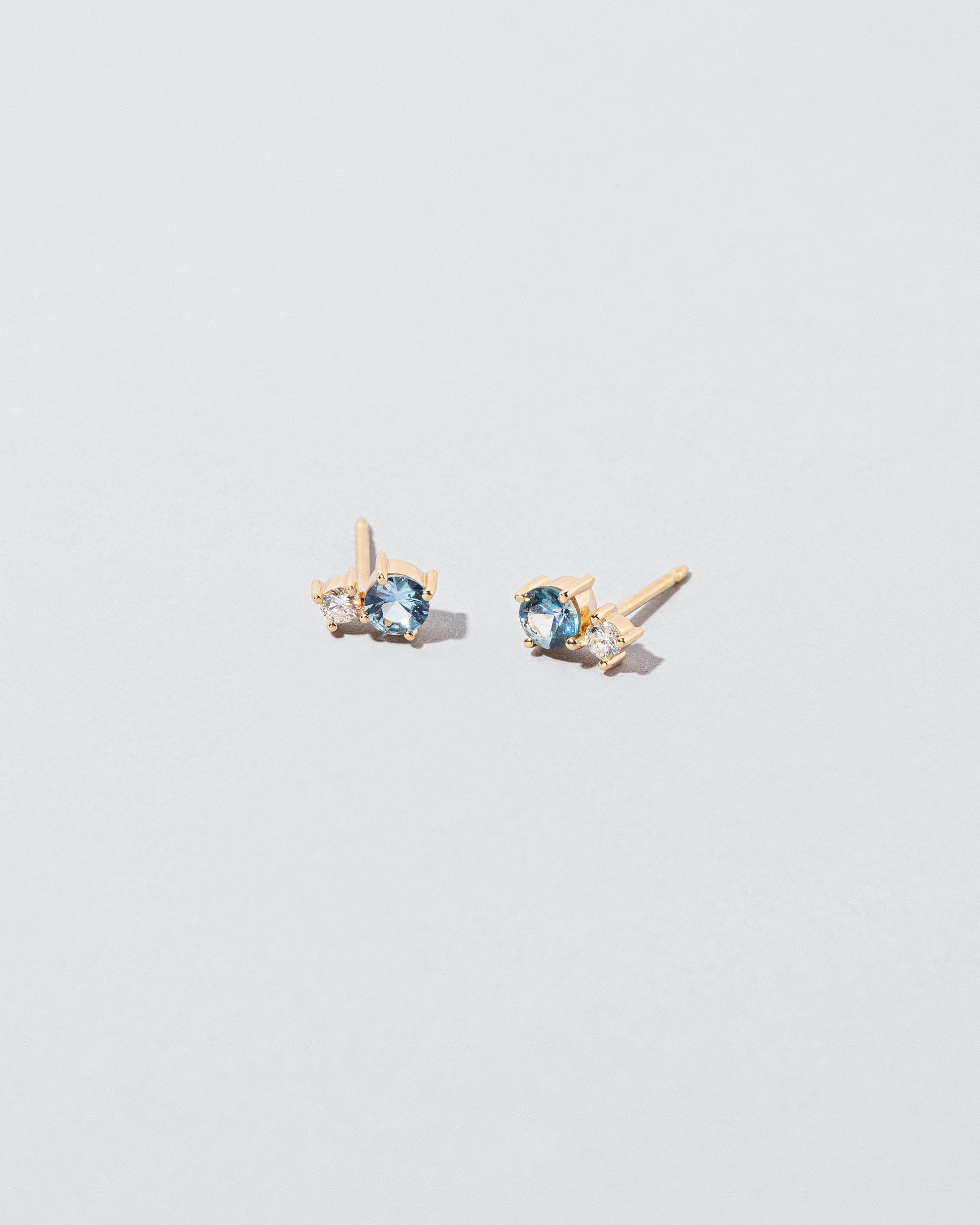  Aster Earrings on light color background.